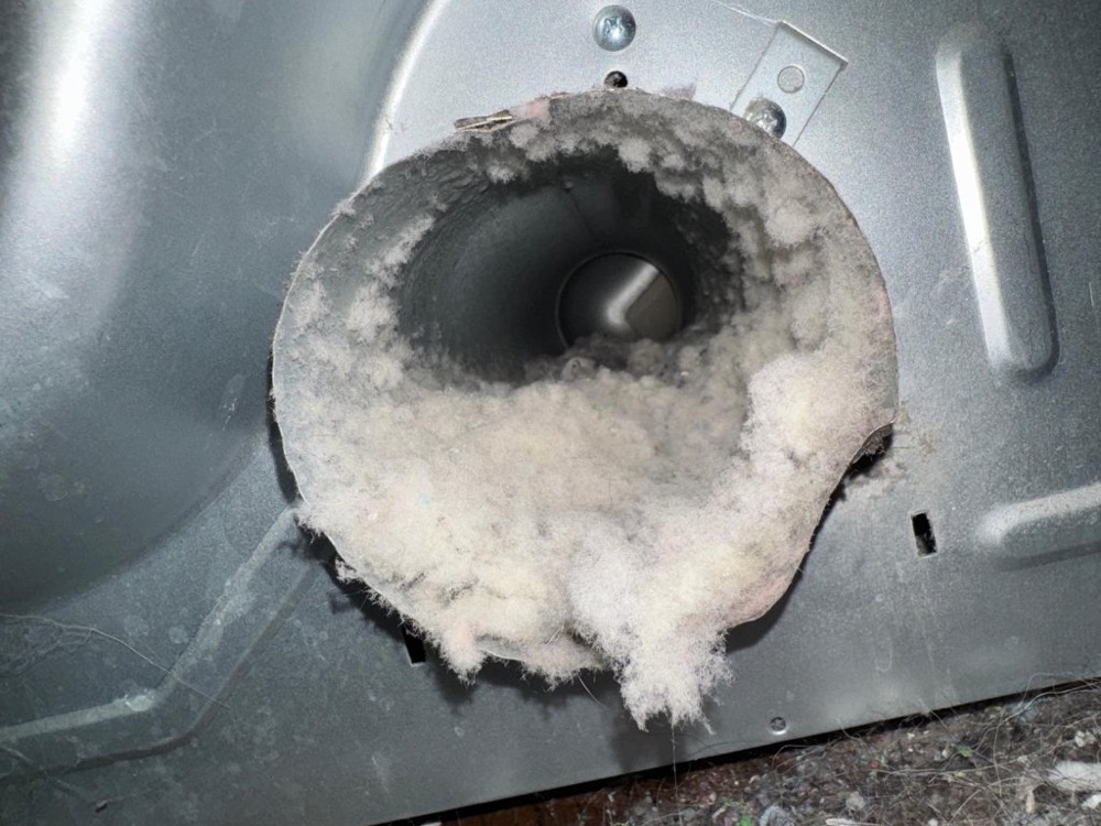 Dangerous lint buildup inside a dryer